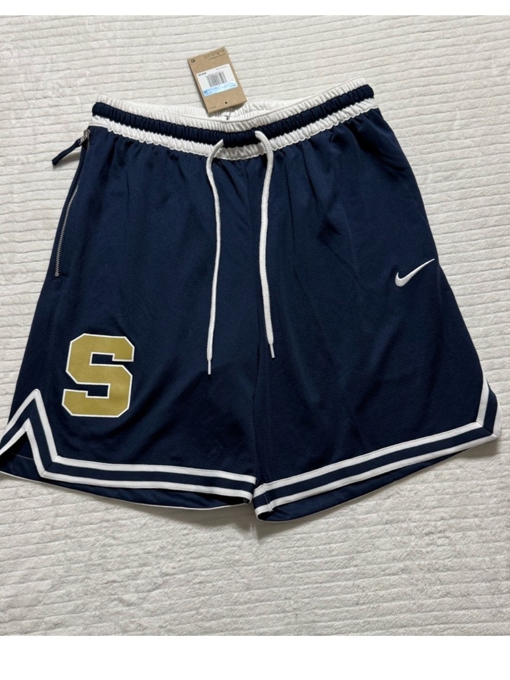 Nike Men's Navy Blue Athletic Shorts with White Trim and Gold 'S' Patch